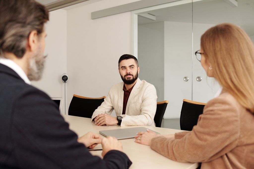 Employment solicitor discussing workplace concerns with a client