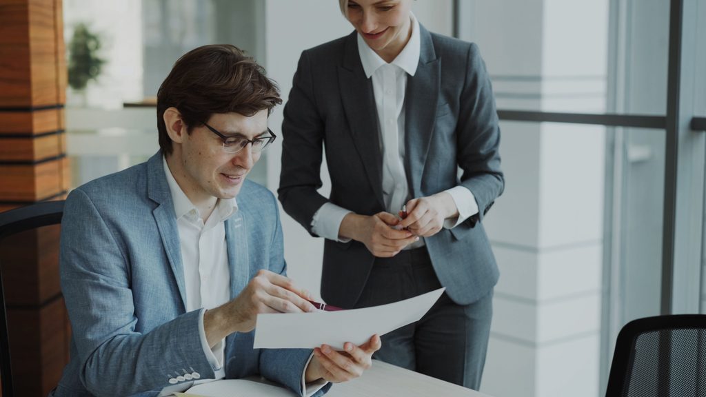 Employee reviewing a performance improvement plan at work in the UK